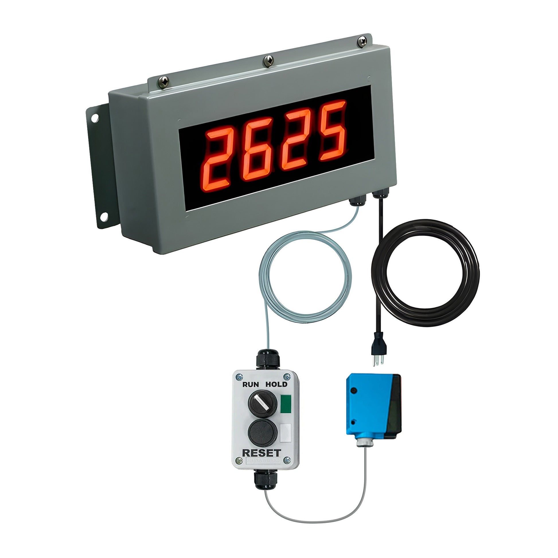 Digital display with red numbers control switchbox and photo eye on a white background