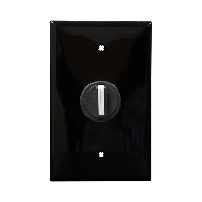 Black wall plate with black 3-position switch on a white background.