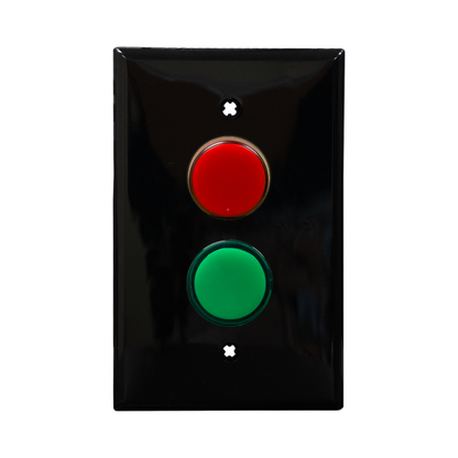 Black wall plate with two pilot lights, one red - one green.