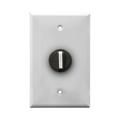 White wall plate with black 3-position switch on a white background.